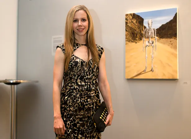 Amy Guidry with her New Realm series painting, Wild West